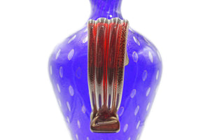 Vaso blu e rosso con bolle