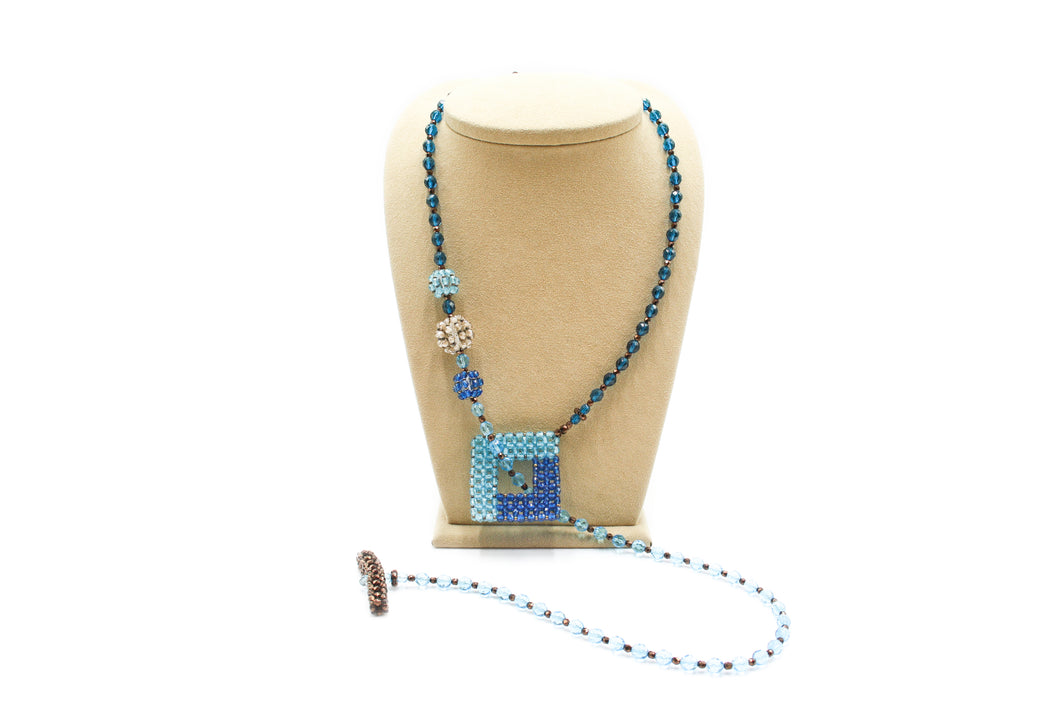 Necklace with 3 balls and square frame - 110 cm - blue, light blue and brown